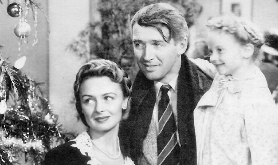 IT’S A WONDERFUL LIFE - George Bailey (James Stewart), Mary Bailey (Donna Reed), and their youngest daughter Zuzu (Karolyn Grimes) PHOTO WIKIPEDIA